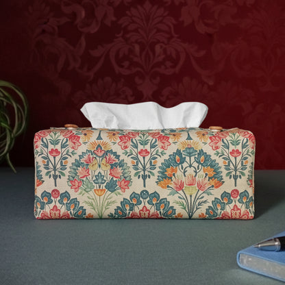 Linen tissue box cover with a pen, notebook, and plant
