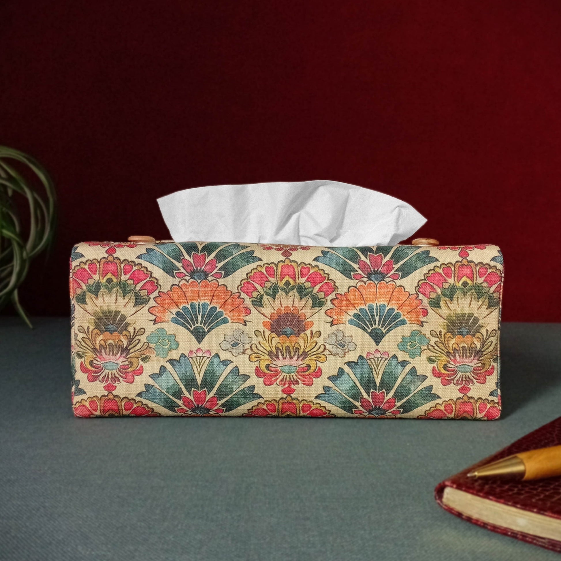 Linen tissue box cover with a colourful folding fan motif pattern on an antiqued tan background