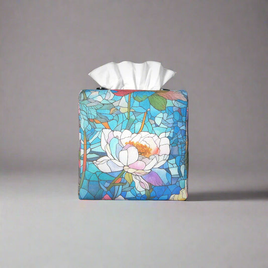 Square tissue box cover with floral garden stained glass design on blue toned background
