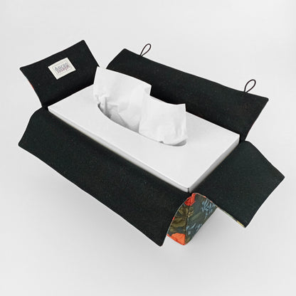 Linen tissue box cover with bright and colourful birds and flowers on a dark blue background