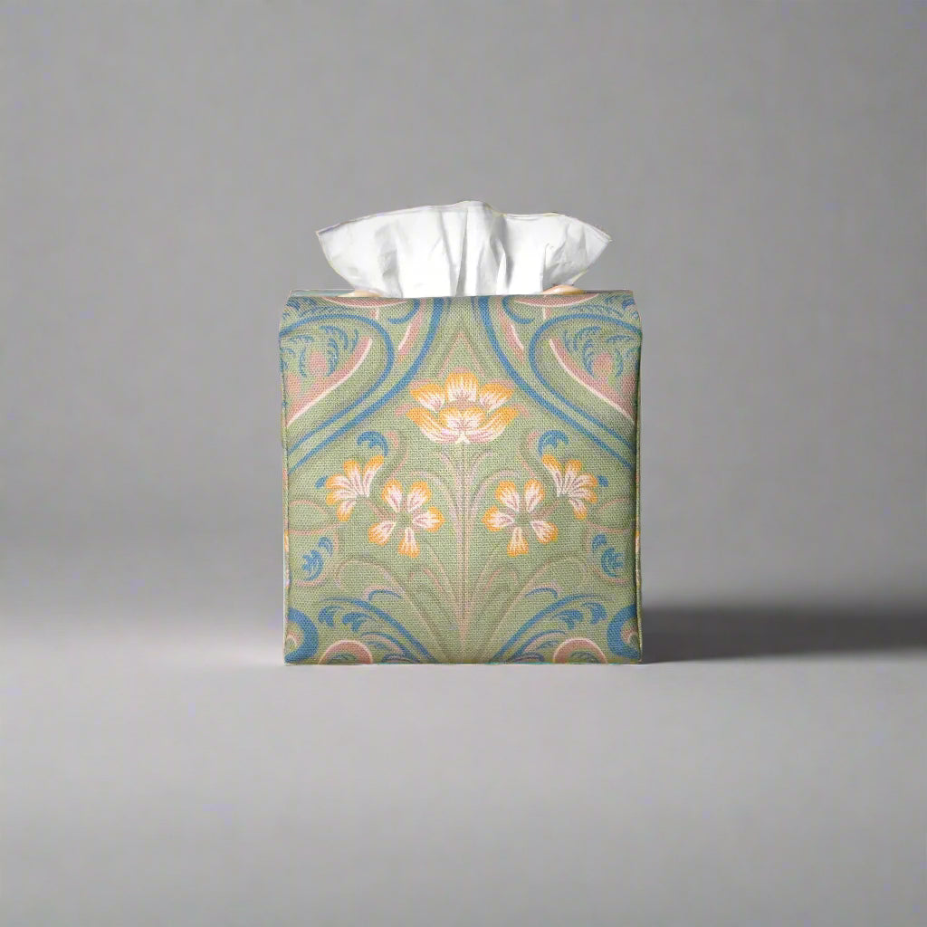 Square tissue box cover with yellow flowers and blue Victorian embellishment on sage green background