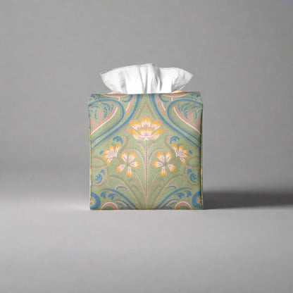 Square tissue box cover with yellow flowers and blue Victorian embellishment on sage green background