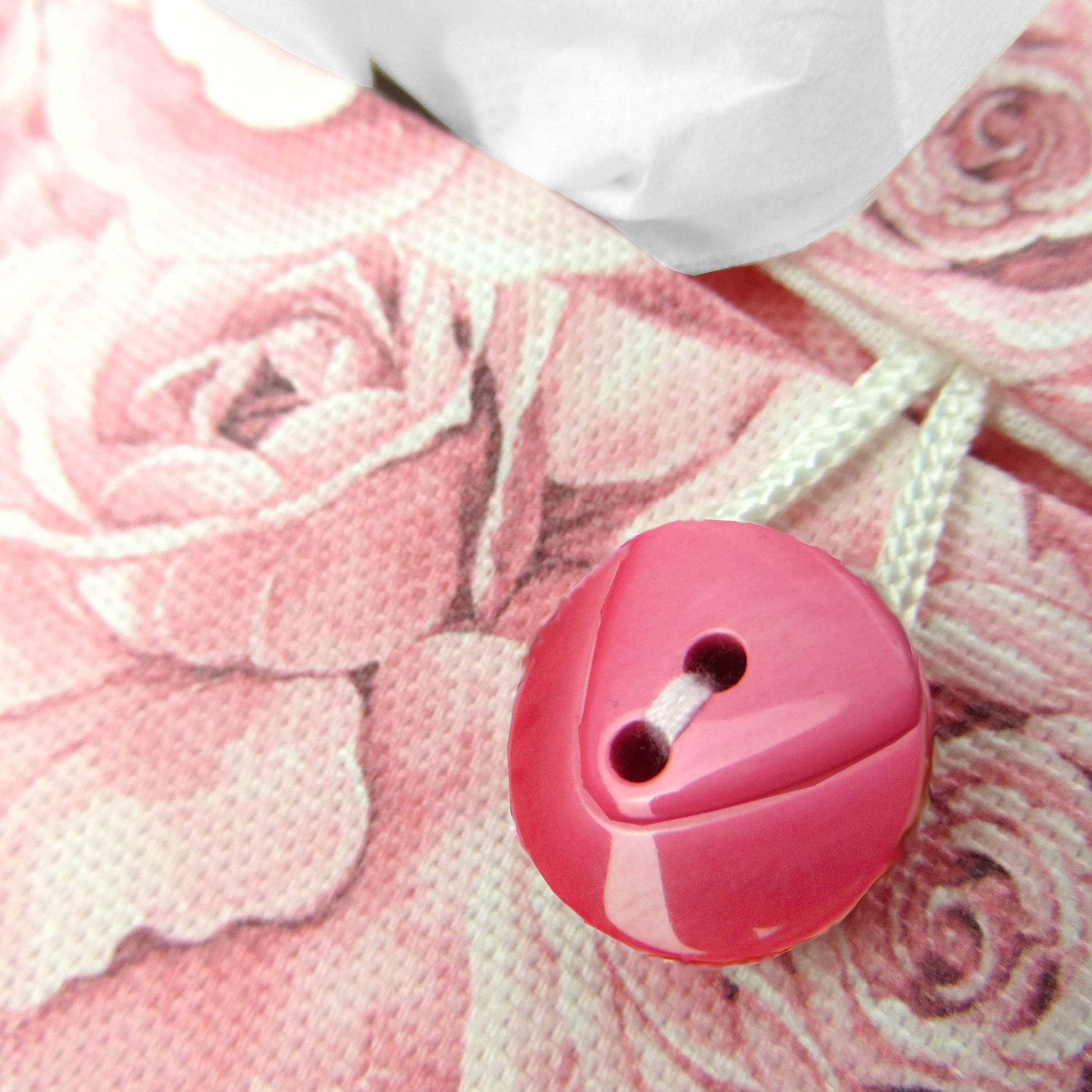 Close up view of cotton rectangle tissue box cover with buttons