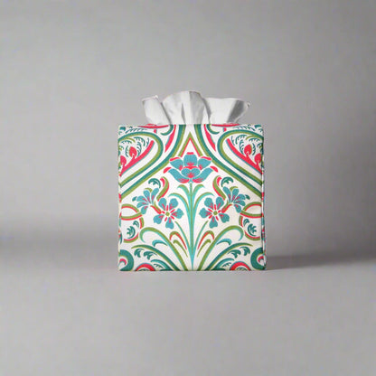 Cotton square tissue box cover with blue flowers and teal and red Victorian embellishment on white background