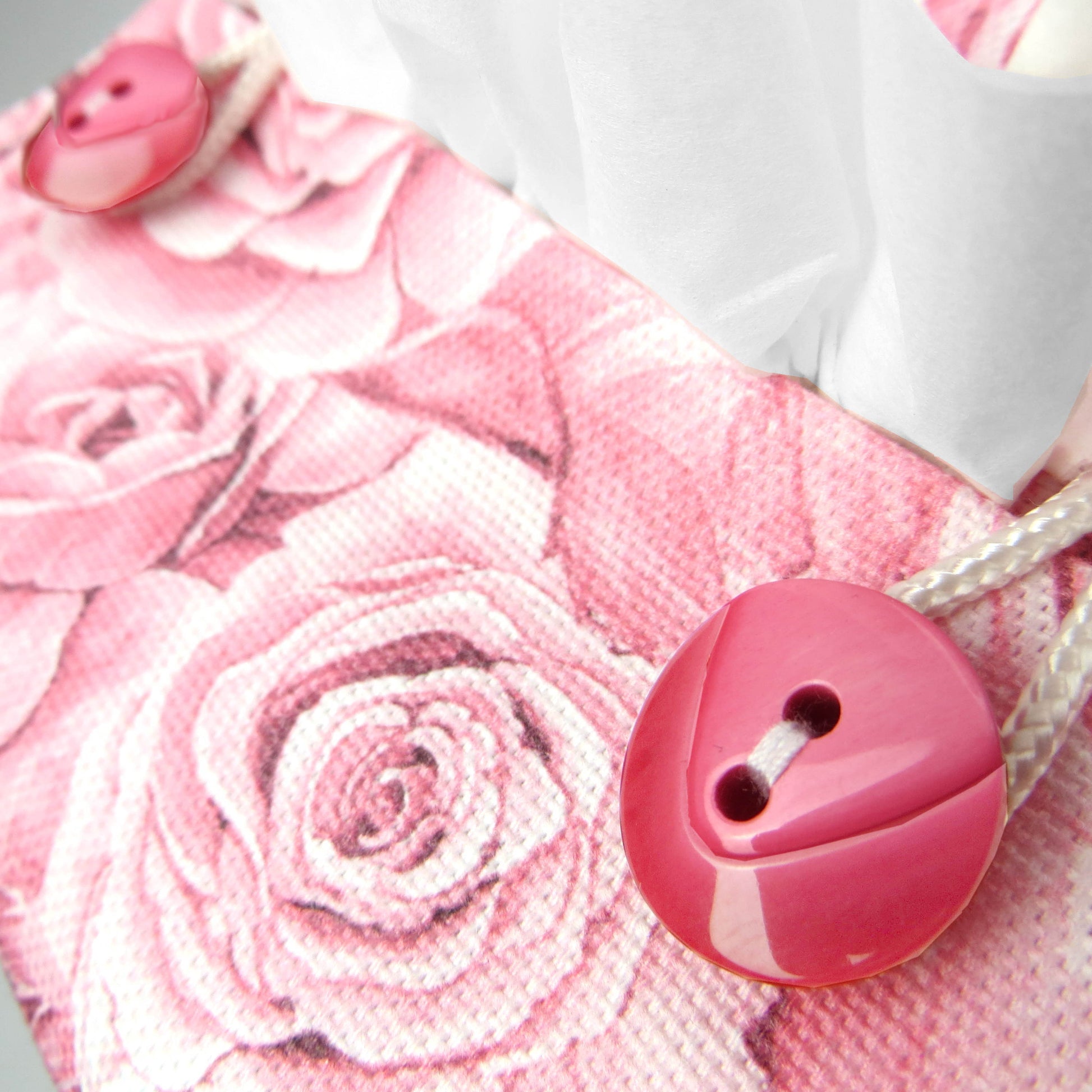 Close up of cotton square tissue box cover with buttons