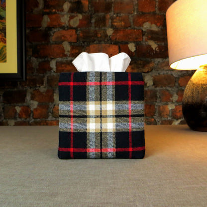 Woven brushed cotton square tissue box cover with black and tan tartan pattern with a red stripe