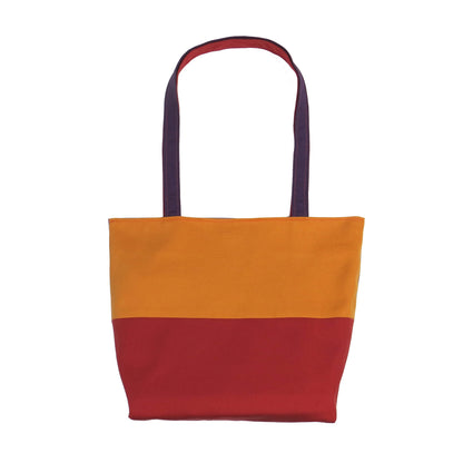 Back view of a large cotton tote bag with two vibrant colours on each side