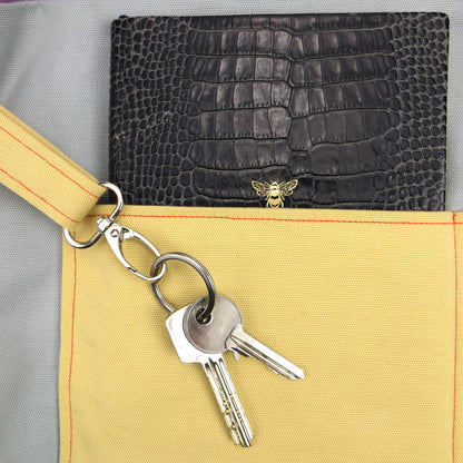 Close up view of a large tote bag interior key clasp