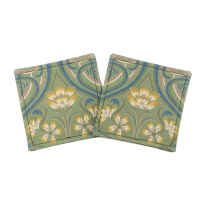 Set of two handmade square coasters with  a Victorian design of yellow flowers with blue embellishments on a sage green background