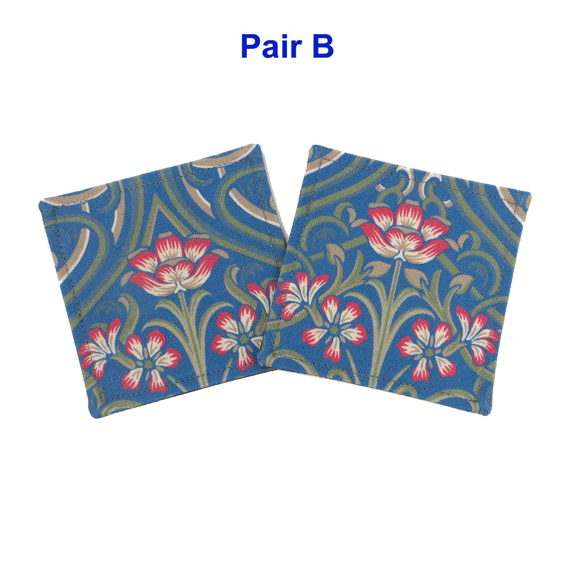 Set of 2 handmade coasters with blue Victorian design with red flowers and green embellishments