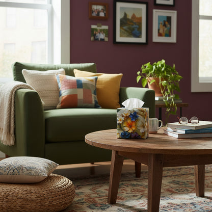 Square tissue box cover sitting on a coffee table in a contemporary home living room