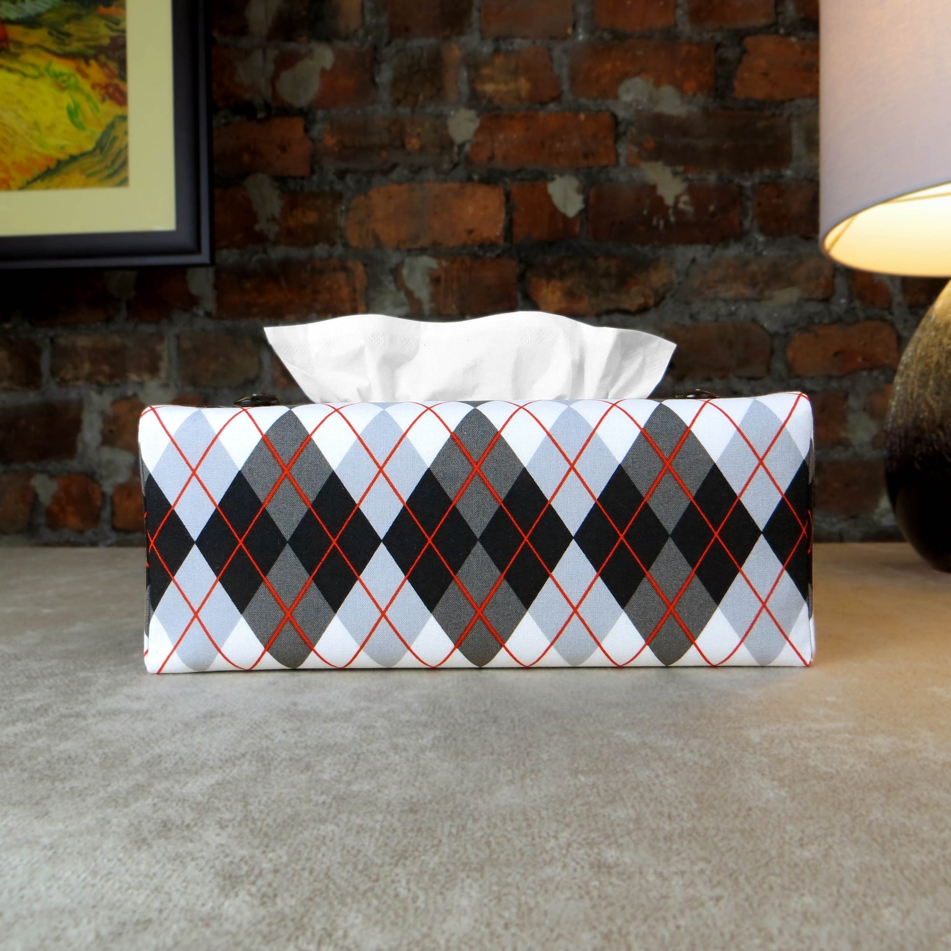 Rectangular tissue box cover with black, grey, and red argyle pattern