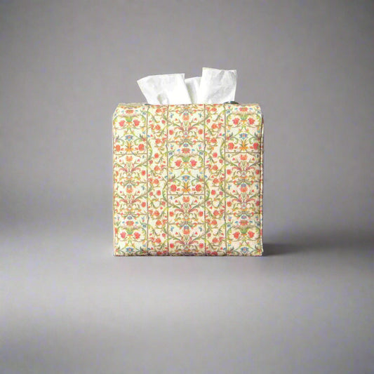 Linen square tissue box cover with winding green vines and red and blue blossoms