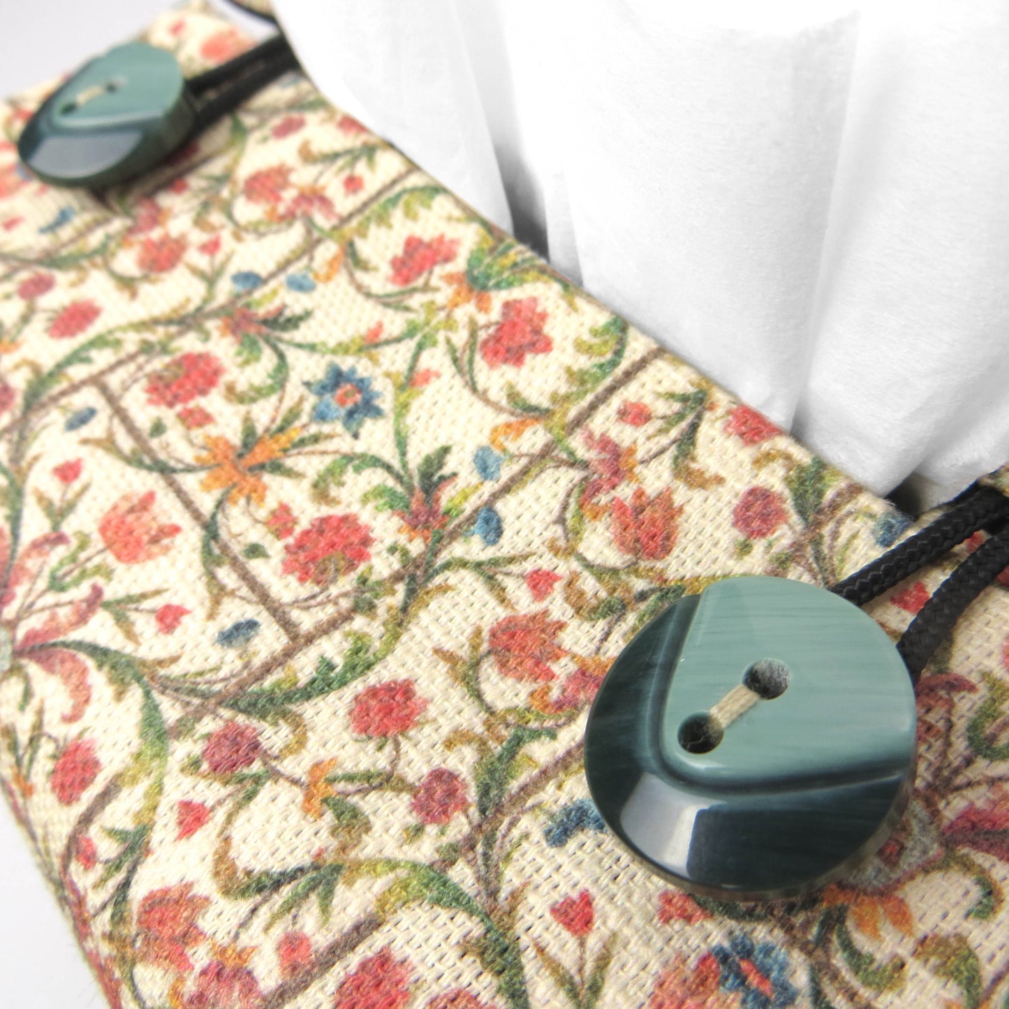 Close up of linen square tissue box cover with buttons
