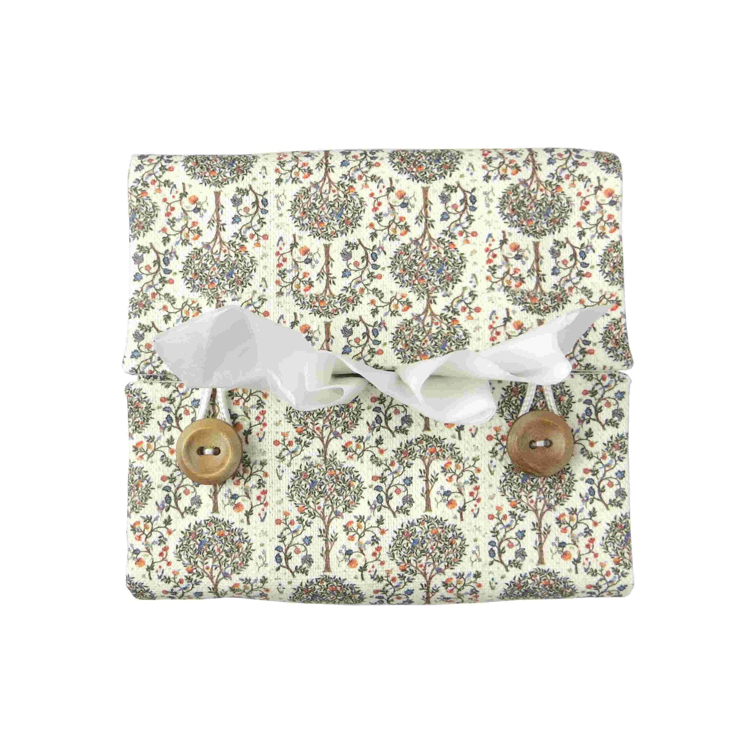 Linen square tissue box cover with a mini orchard grove pattern