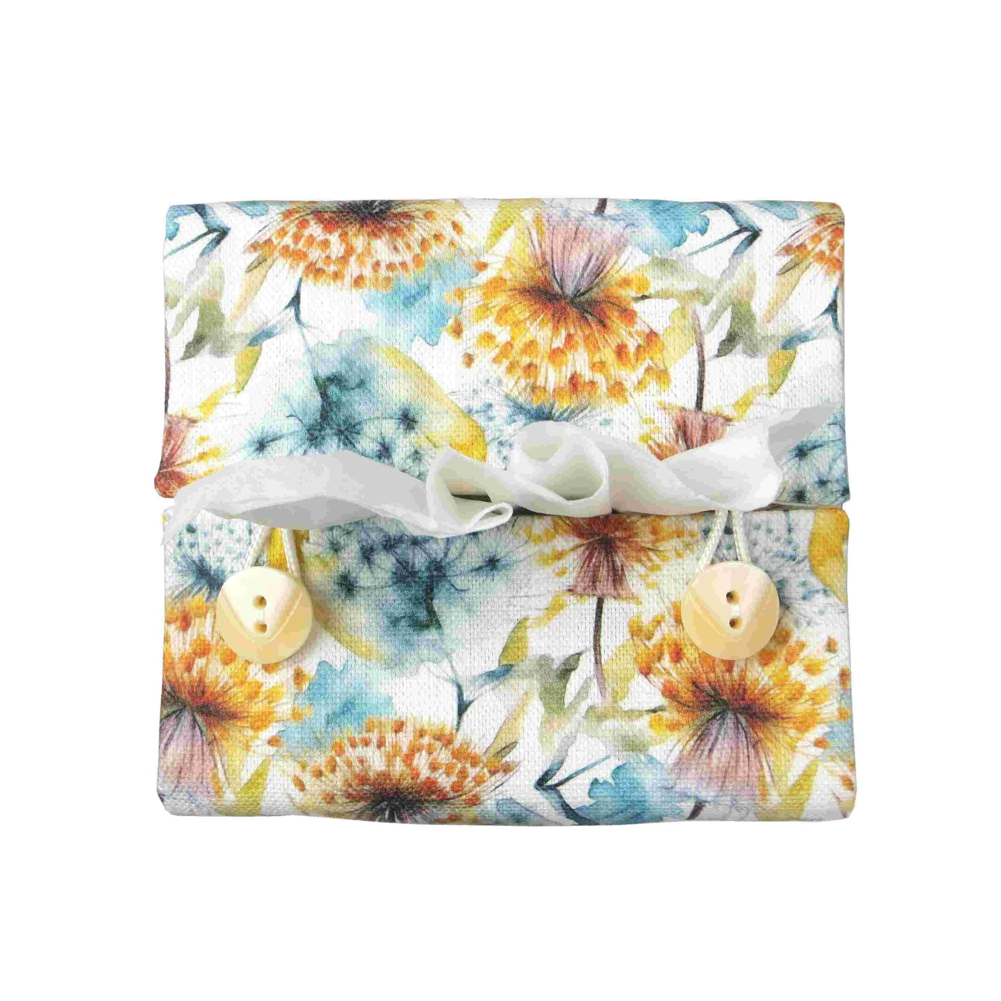 Linen square tissue box cover with watercolour-style dandelion design in yellow and blue