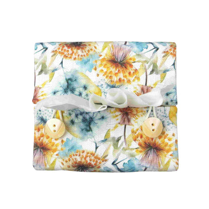 Linen square tissue box cover with watercolour-style dandelion design in yellow and blue