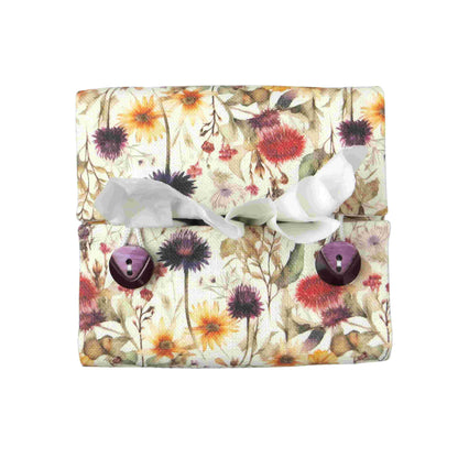 Linen square tissue box cover with  colourful wildflowers in a watercolour-style design