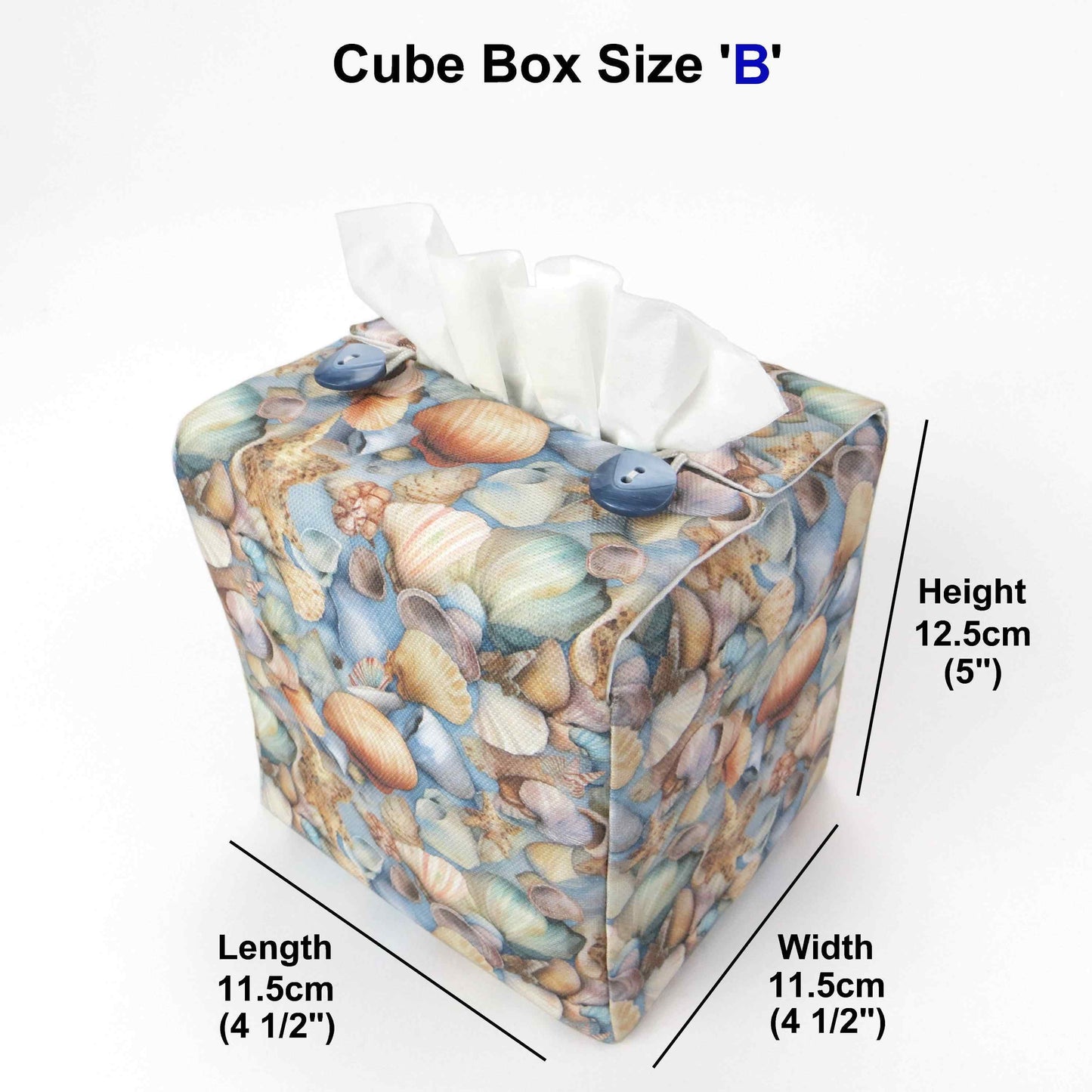 Cotton square tissue box cover with soft pastel seashell images set against a light blue background