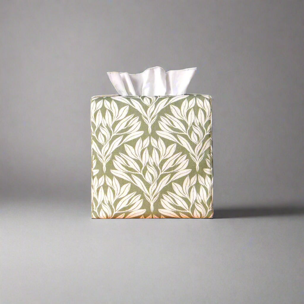 Linen square tissue box cover with an off-white leaf pattern on a sage green background