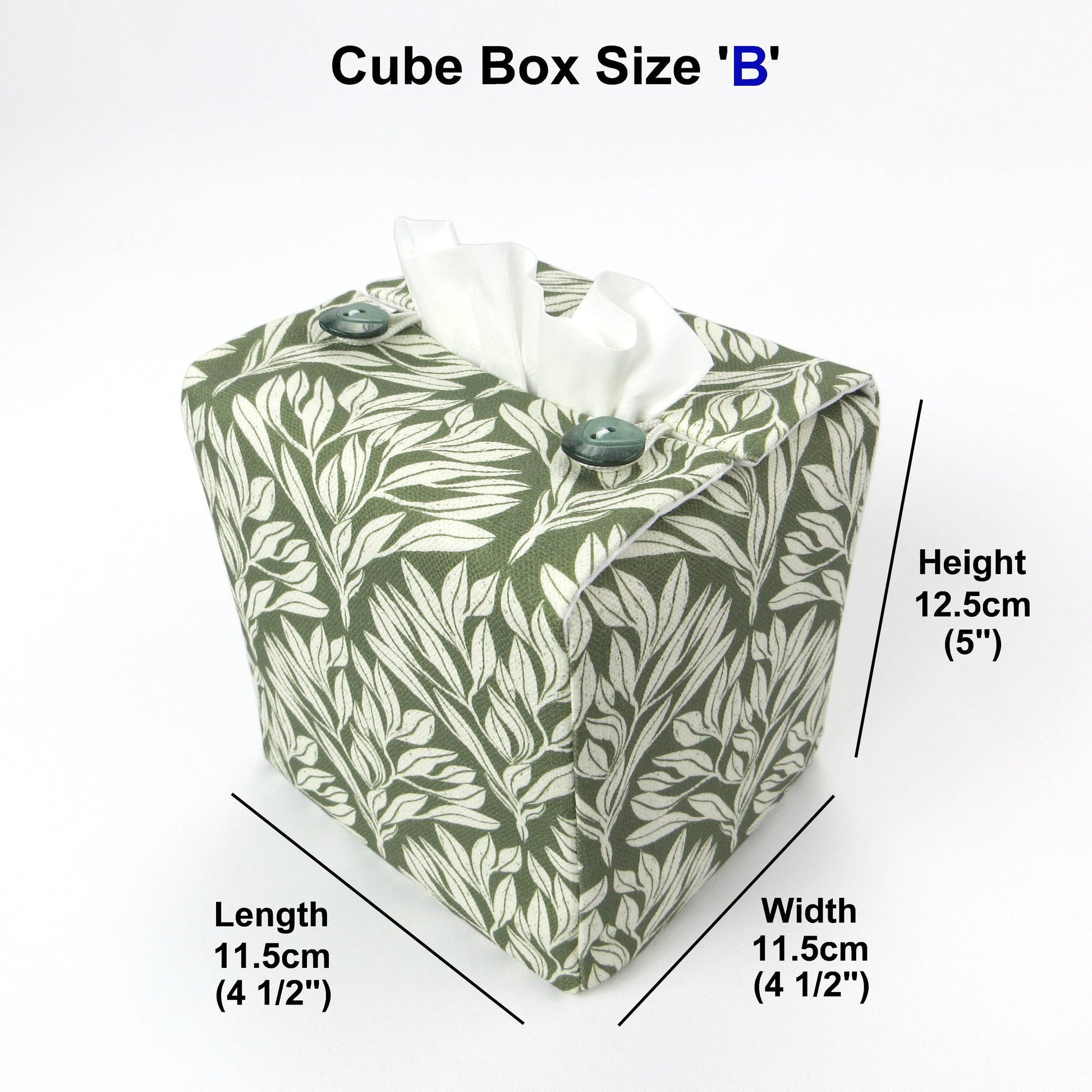 Linen square tissue box cover with an off-white leaf pattern on a sage green background