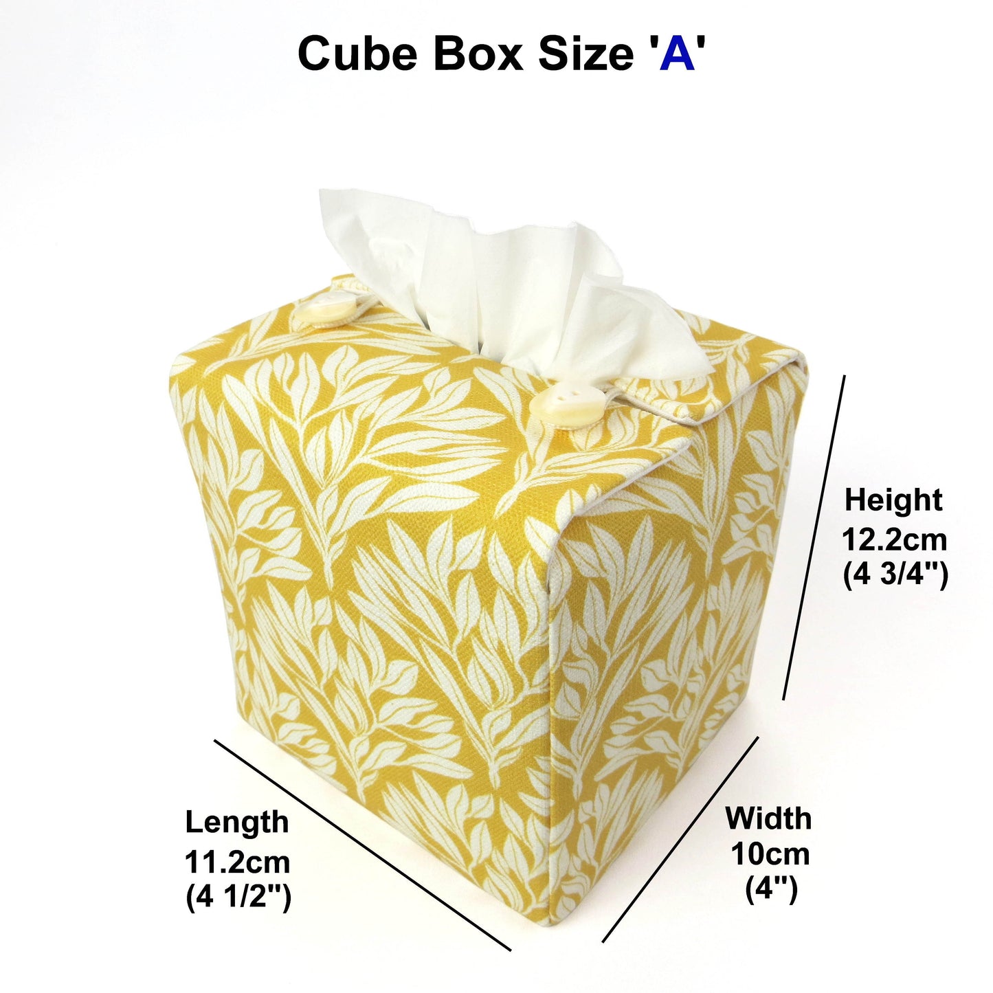 Linen square tissue box cover with an off-white leaf design on a yellow background