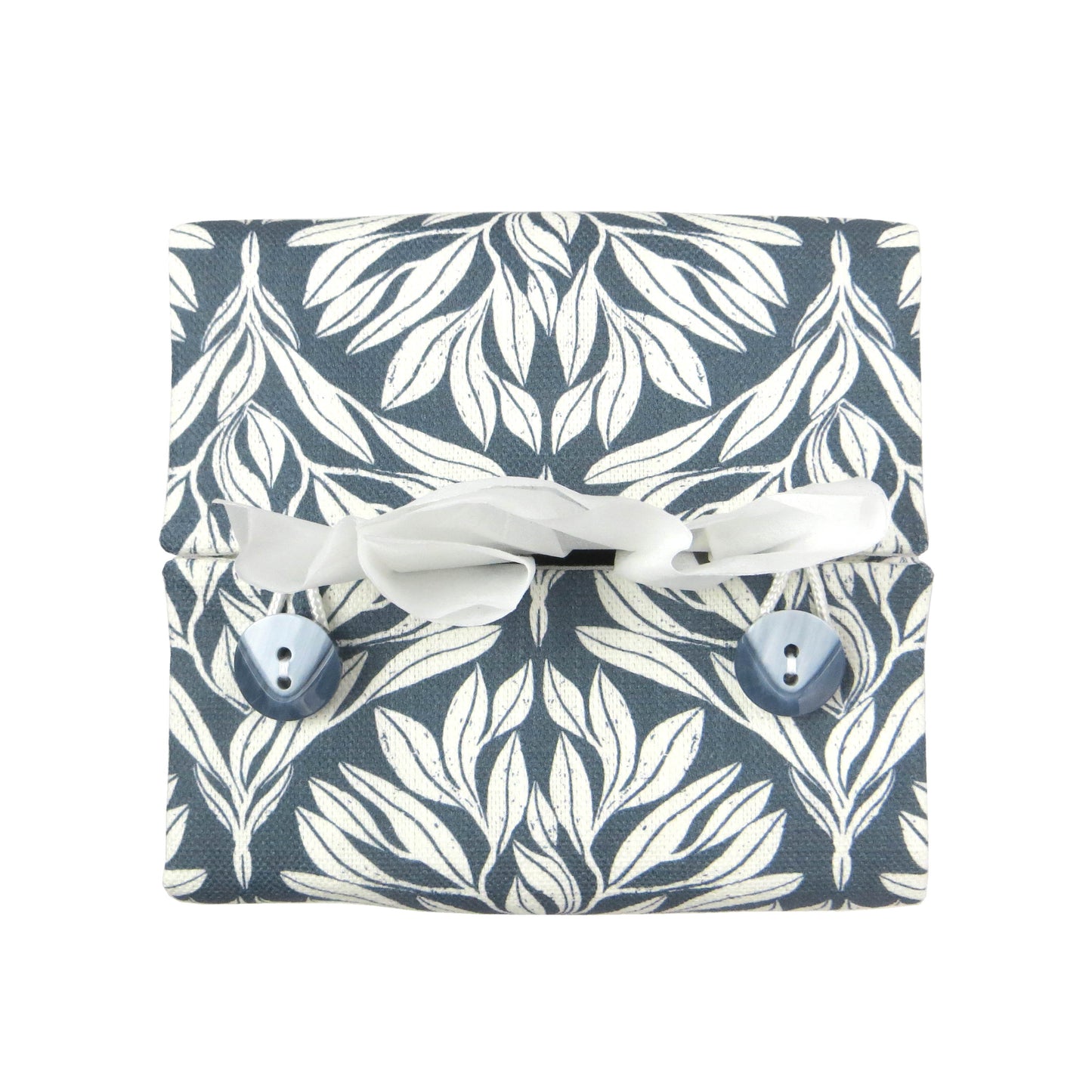 Linen square tissue box cover with an off-white leaf pattern on a blue background
