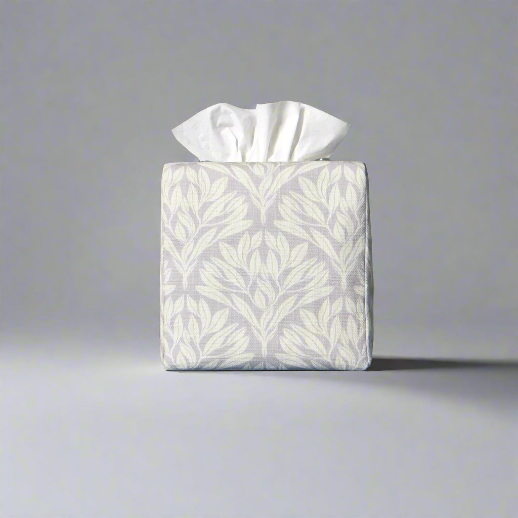 Square linen tissue box cover with off-white leaf design on a light grey background