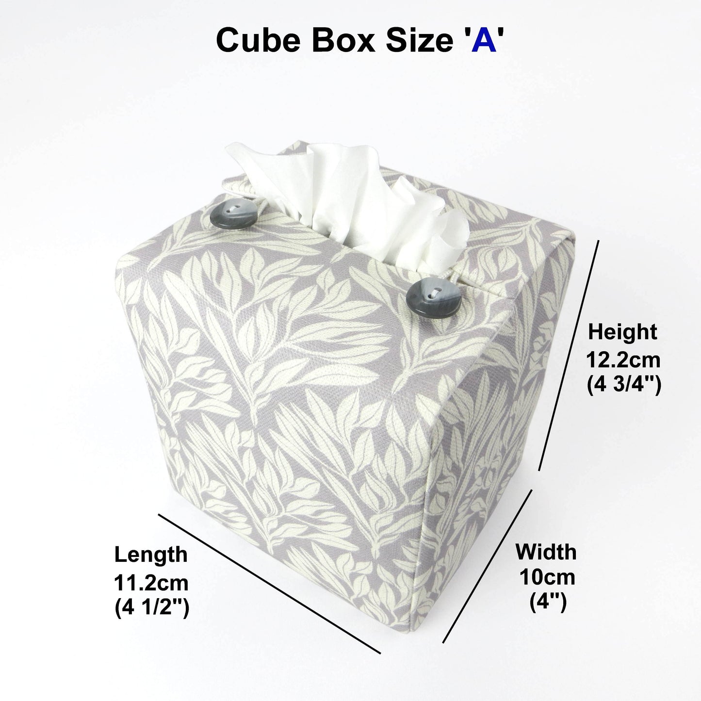 Square linen tissue box cover with off-white leaf design on a light grey background