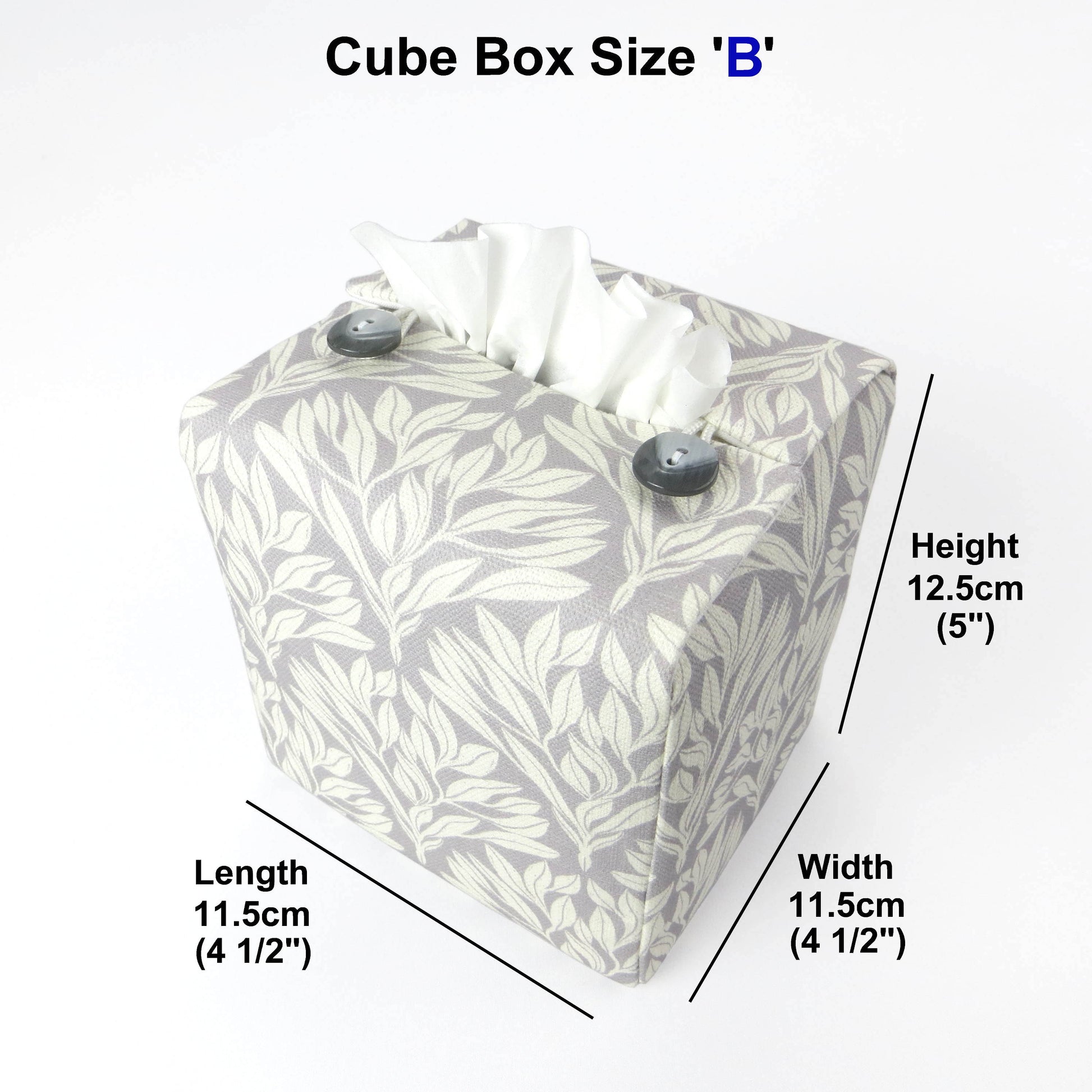Square linen tissue box cover with off-white leaf design on a light grey background