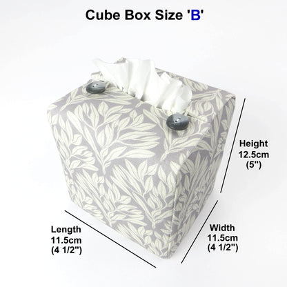 Square linen tissue box cover with off-white leaf design on a light grey background
