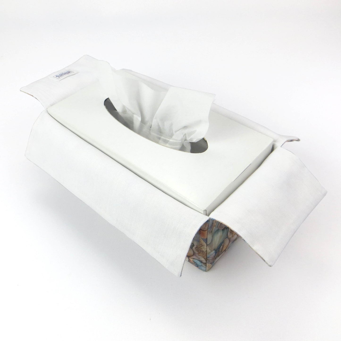 Cotton rectangle tissue box cover with pastel seashells on a soft blue background