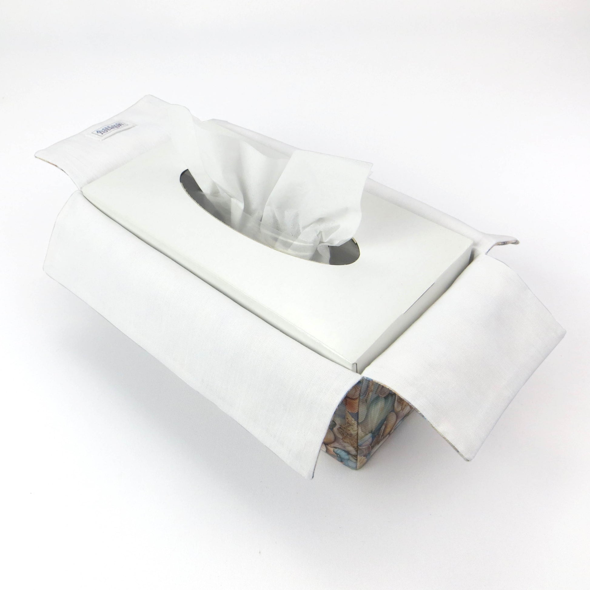 Cotton rectangle tissue box cover with pastel seashells on a soft blue background