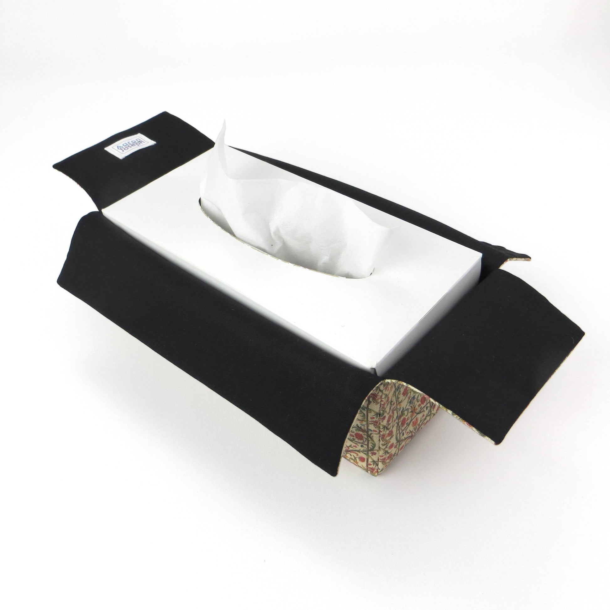 Linen rectangle tissue box cover with green vines with red and blue blossoms