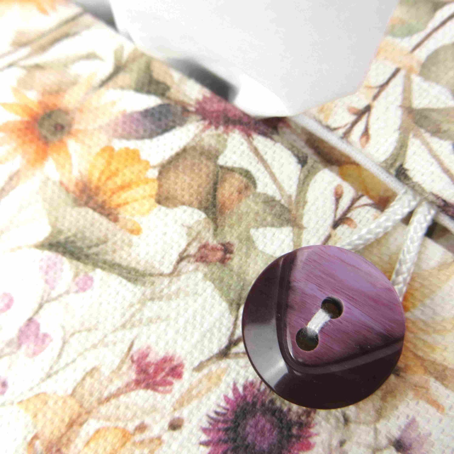 Linen rectangular tissue box cover with  colourful wildflowers in a watercolour-style design