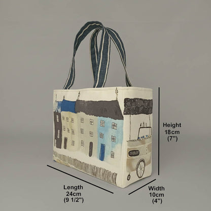 A handmade cotton mini tote bag with seaside themed illustrations and product measurements.