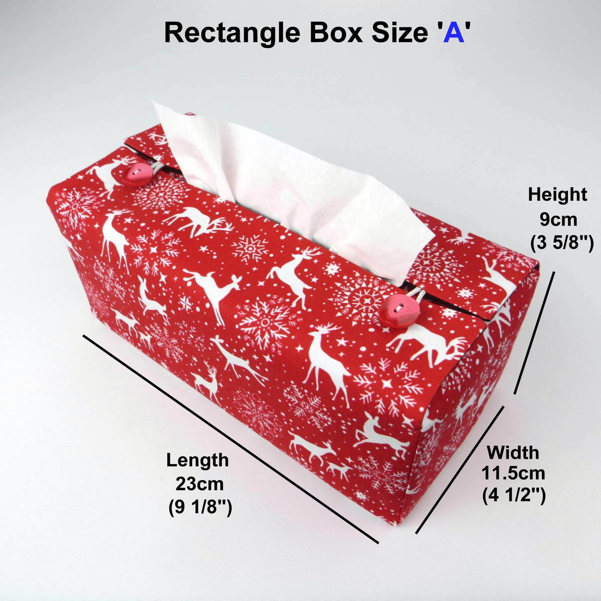 Rectangular tissue box cover with holiday themed white reindeer design on red background
