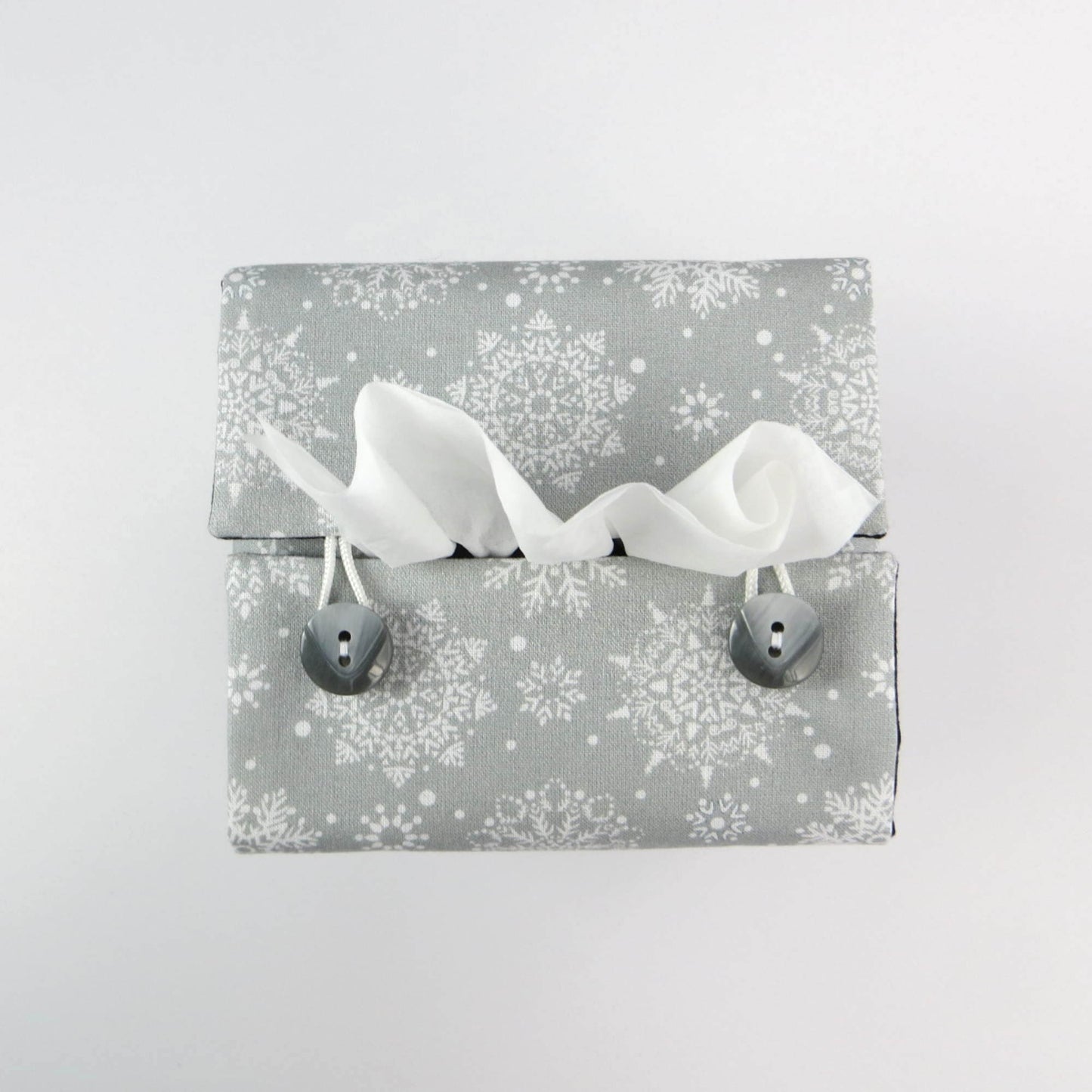 Top view of square tissue box cover with buttons