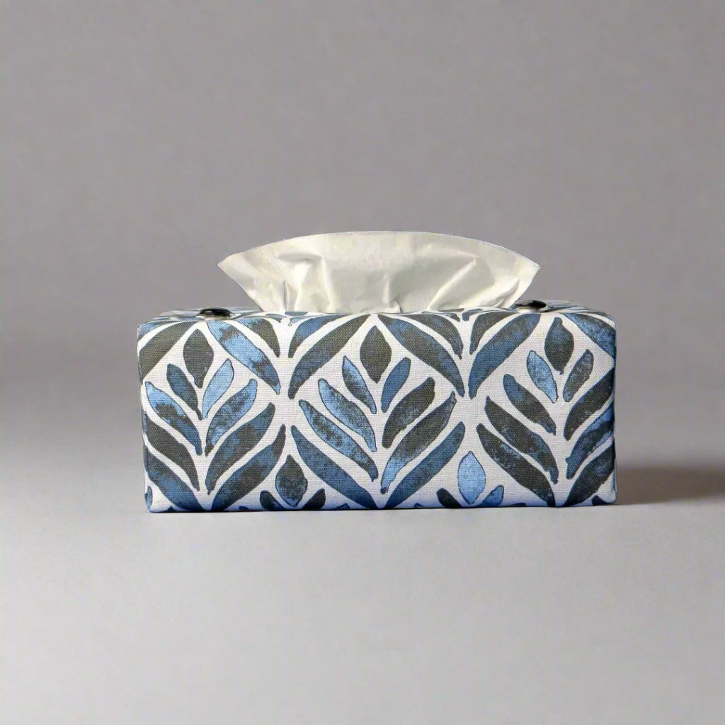 Rectangle tissue box cover with navy blue watercolour style leaf pattern on white background