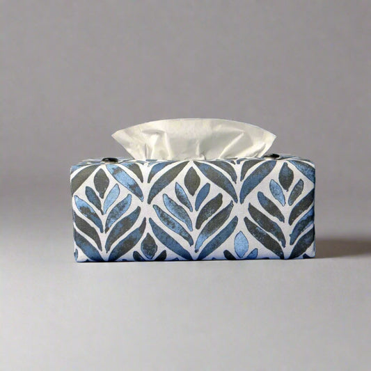 Rectangle tissue box cover with navy blue watercolour style leaf pattern on white background