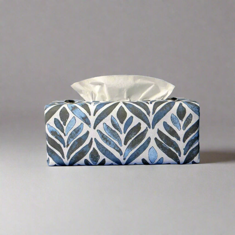 Rectangle tissue box cover with navy blue watercolour style leaf pattern on white background
