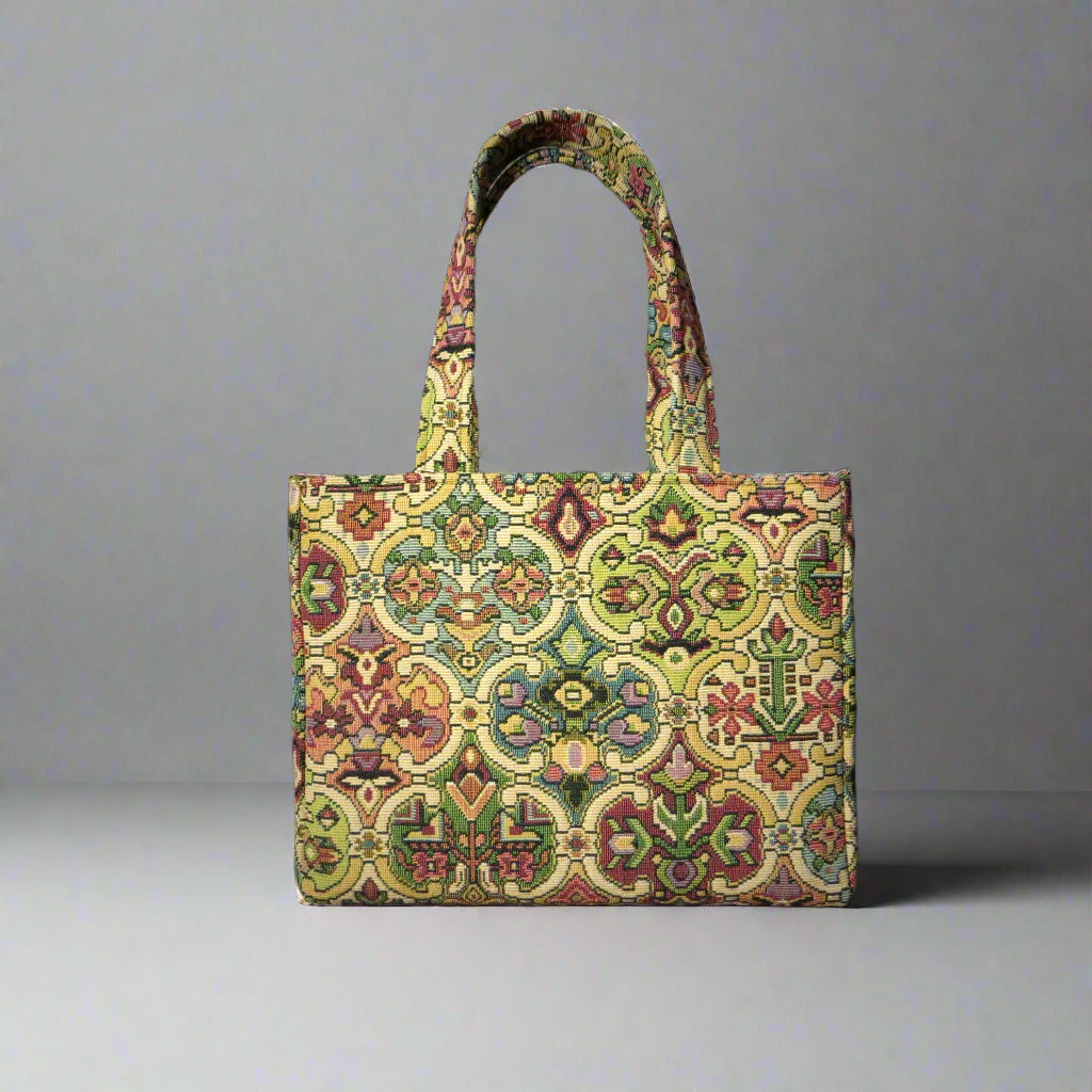 Mini tote bag with multi colour geometric pattern and purple velvet lining