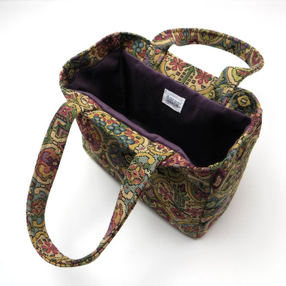 Mini tote bag with multi colour geometric pattern and purple velvet lining