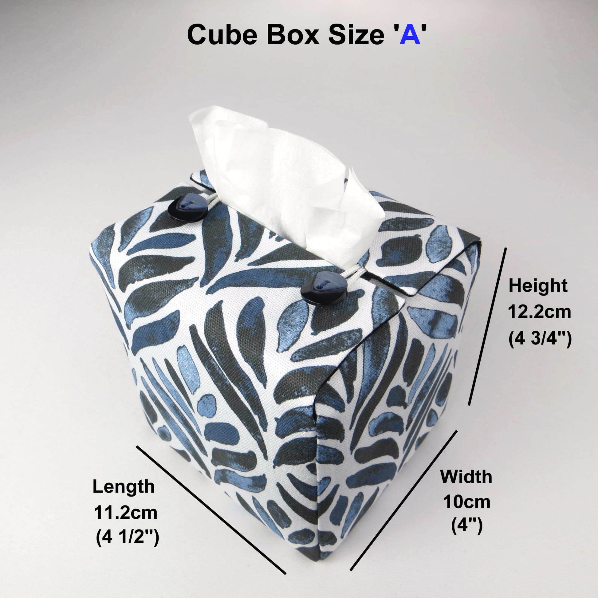 Square tissue box cover with navy blue watercolour style leaf pattern on white background