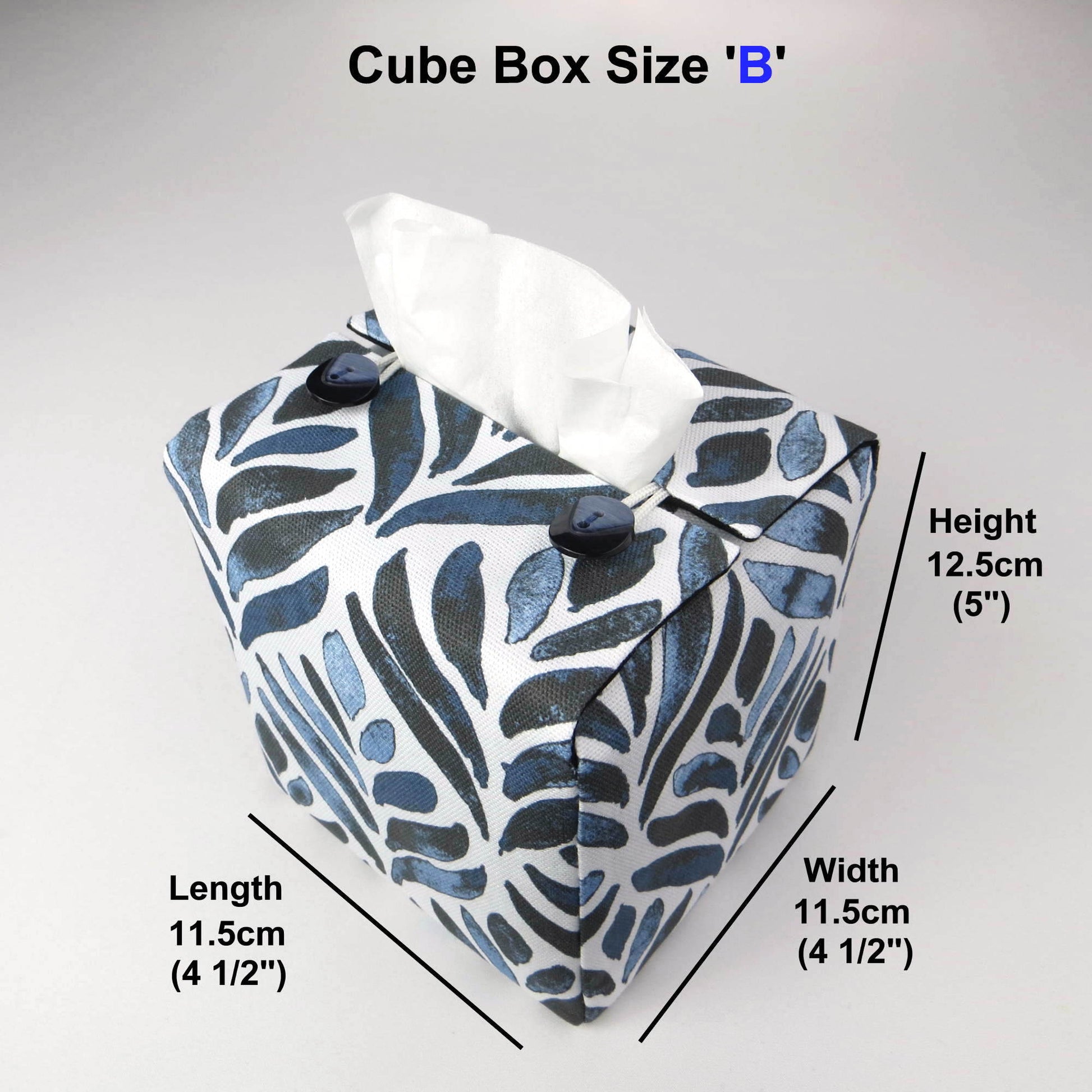 Square tissue box cover with navy blue watercolour style leaf pattern on white background