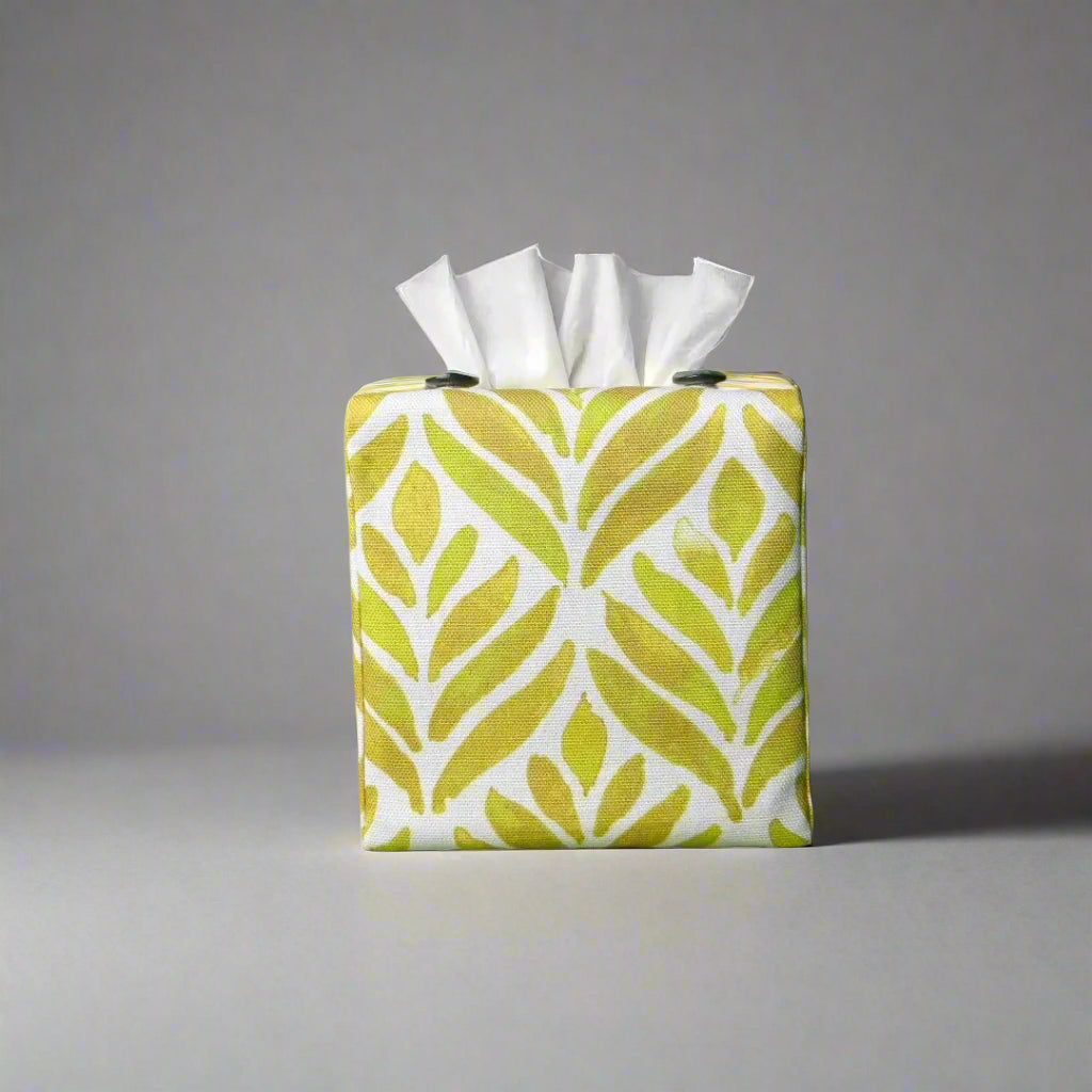 Square tissue box cover with yellow watercolour style leaf pattern on white background