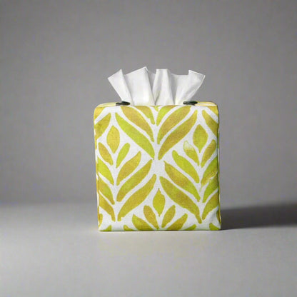 Square tissue box cover with yellow watercolour style leaf pattern on white background