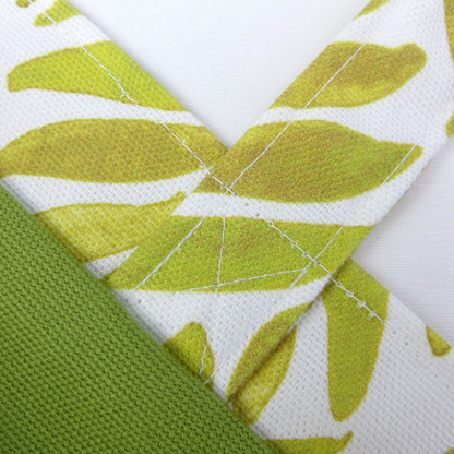 Close up view of a mini tote bag exterior and interior fabric