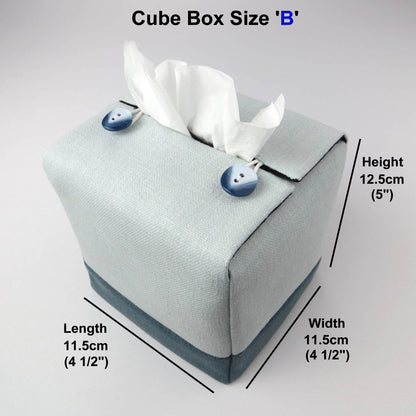Square tissue box cover with light blue top and dark blue base