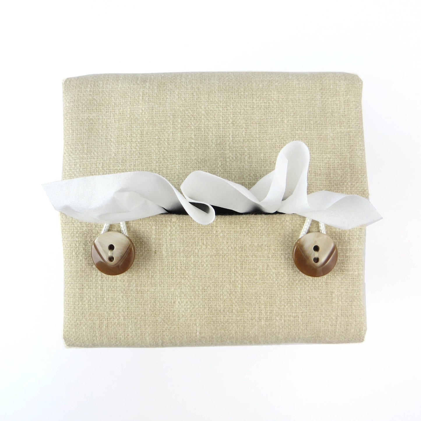 Top view of square tissue box cover with buttons